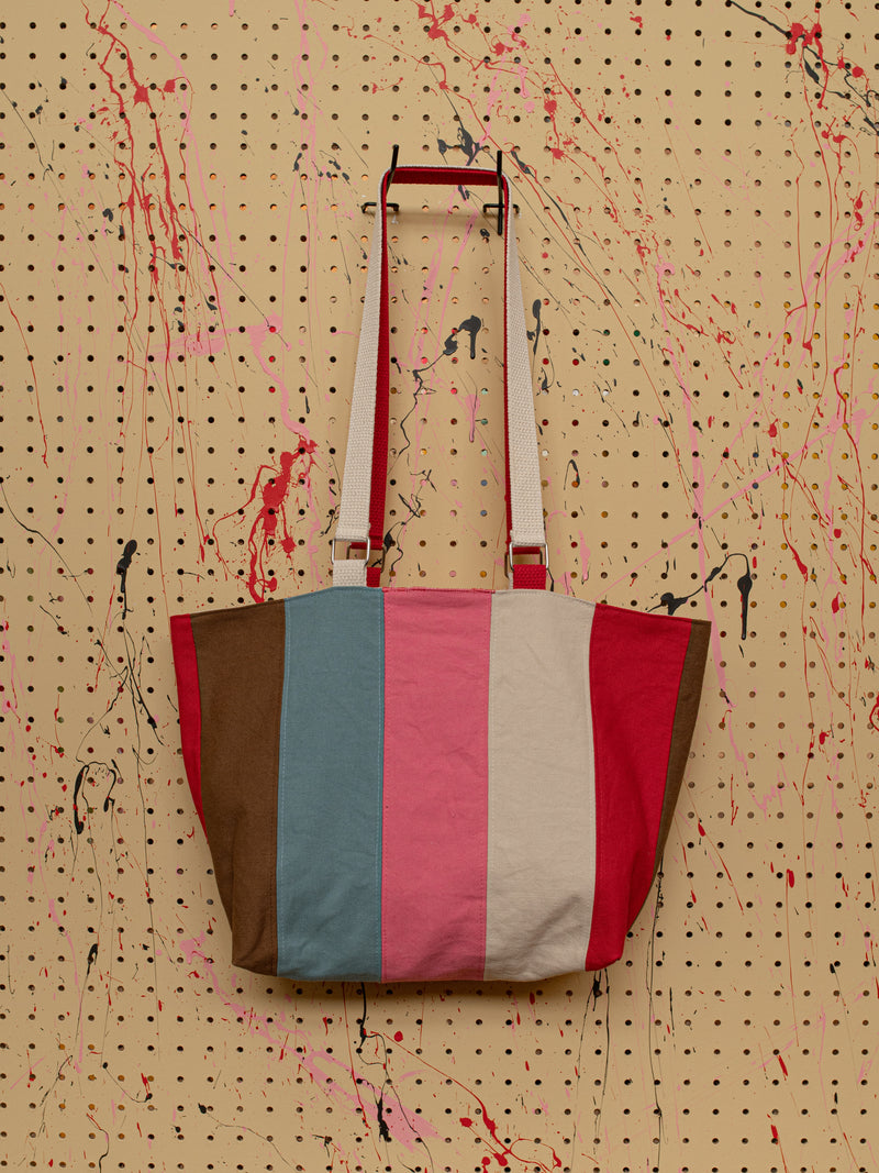 Striped Bag with logo patch — front